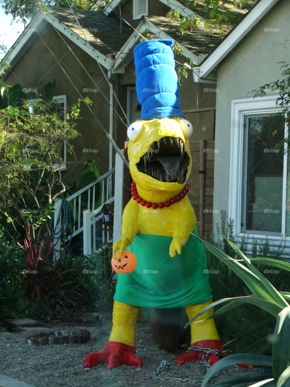 Dinosaur Statue Dressed As Marge Simpson