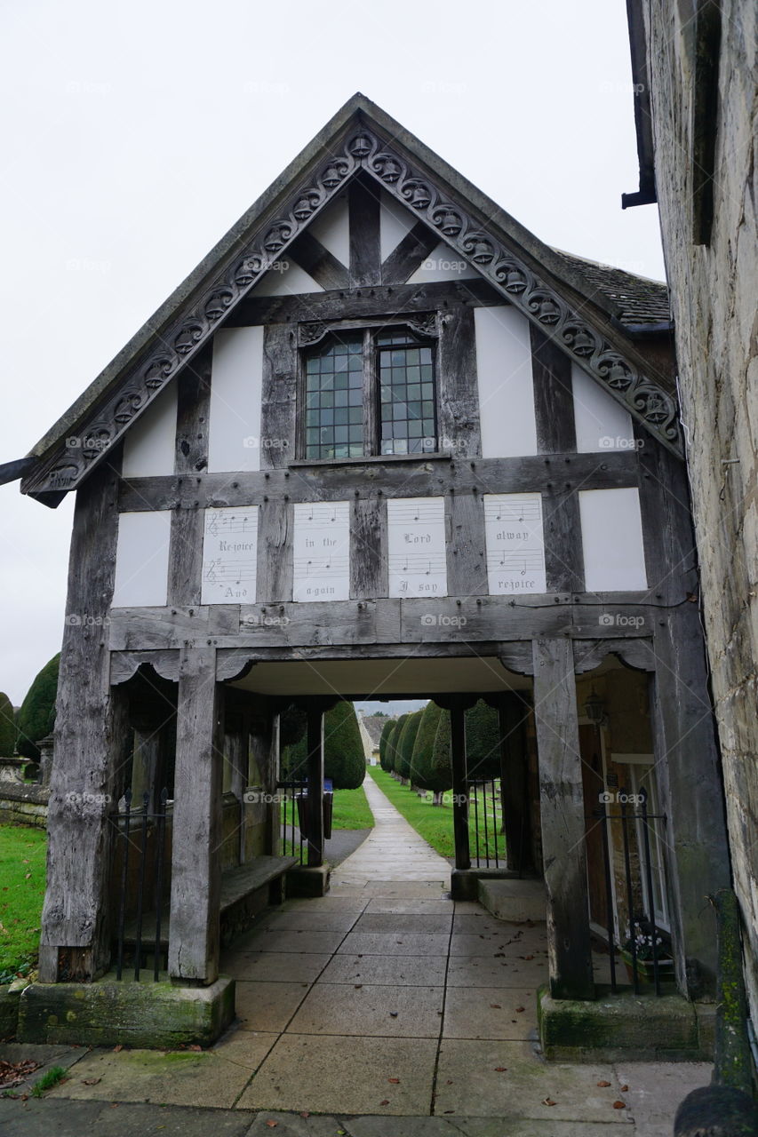 Olde English Building Tudor Style .. entrance to a church in the Cotswolds 