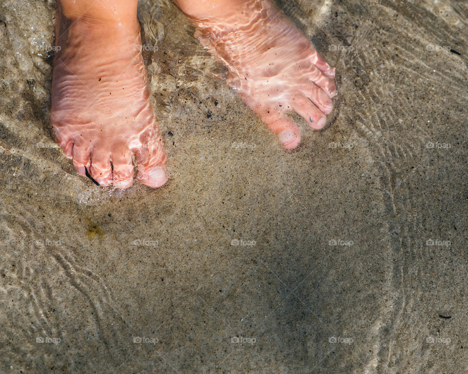 Toes in the ocean