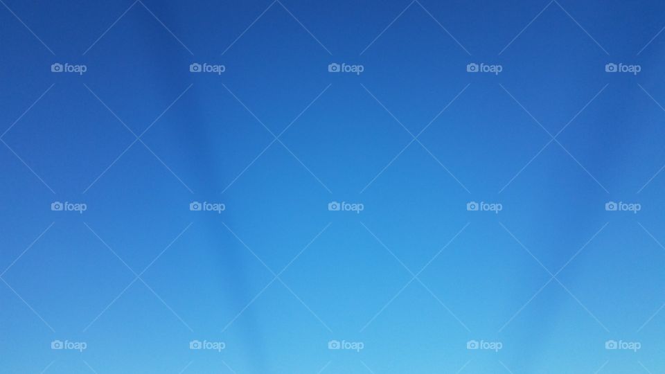 odd V shadow in clear sky