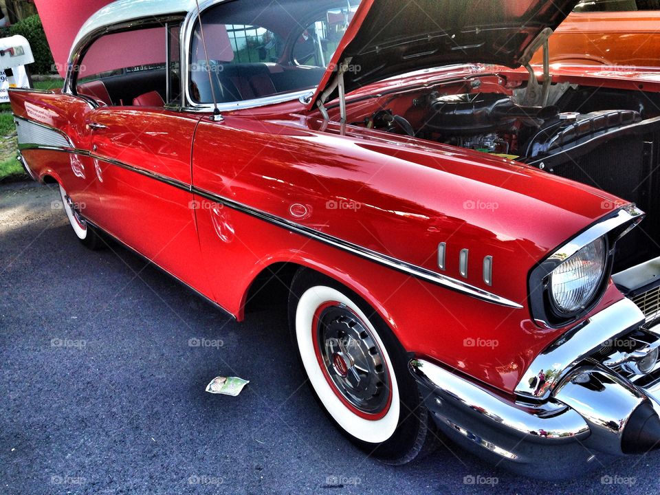 Wings to fly . 50's Bel Air at a car show