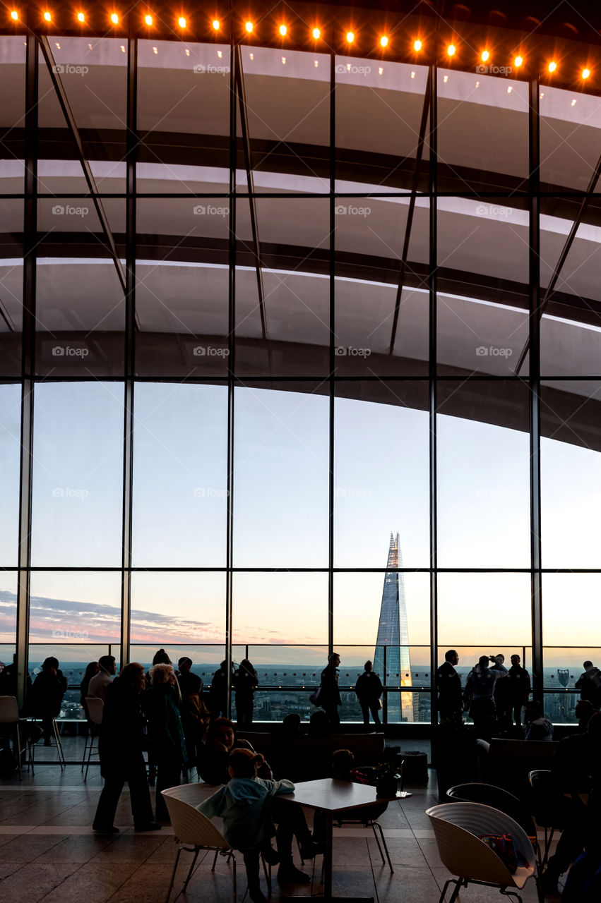 Visitors enjoying view over London from public Sky Garden Terraces. London. UK.