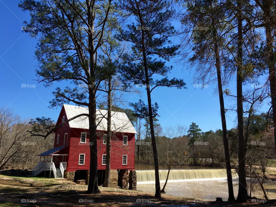 Red mill and waterfall