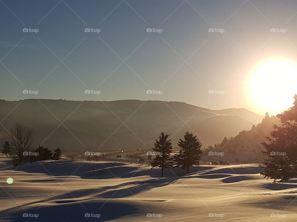 Sunrise over a winter mountain