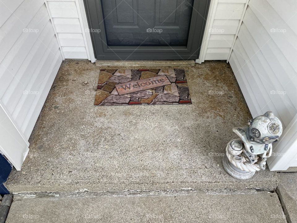 Front porch, view of front porch, view approaching a house, welcome mat 