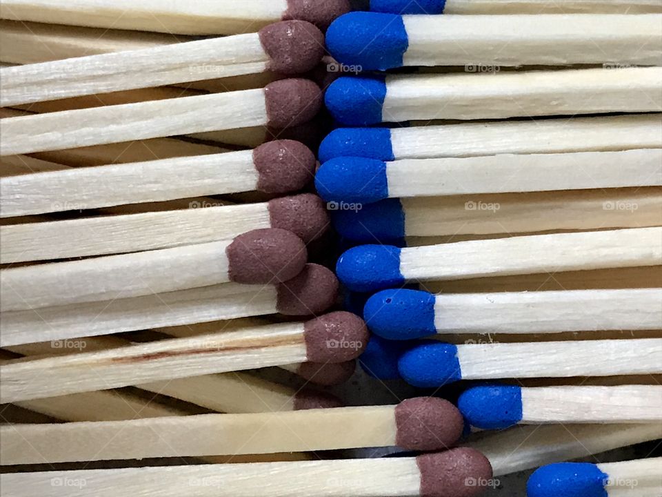 Blue and brown matchsticks 