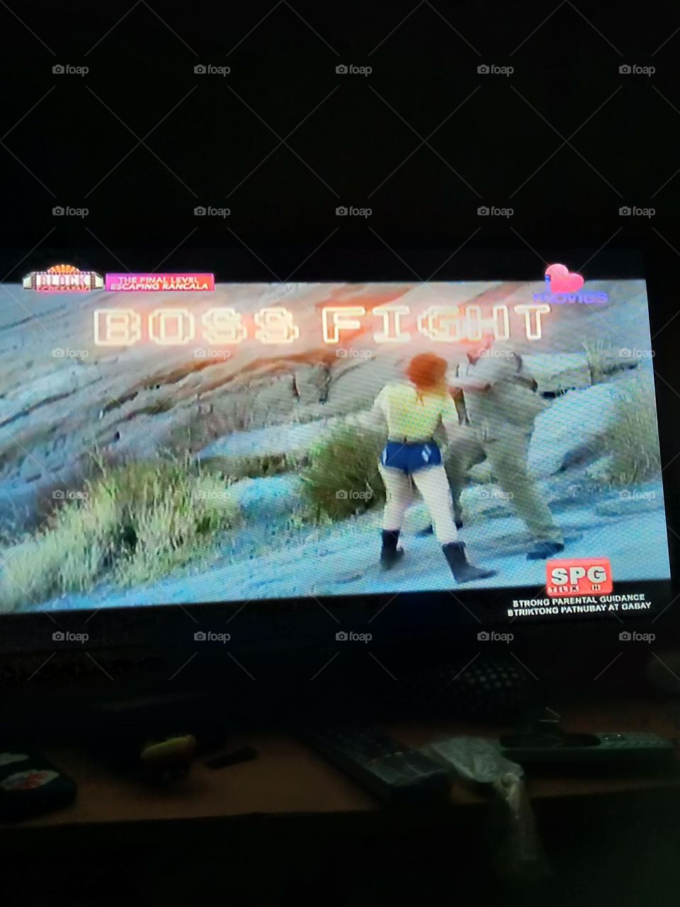 WATCHING MOVIE THE FINAL LEVEL ESCAPING RANCALA, BOSS FIGHT,  THE LEADING LADY IS FIGHTING AGAINST A BAD GUY