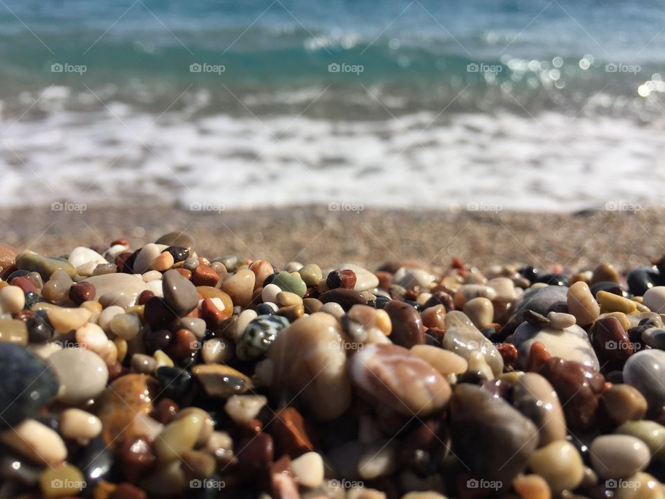 Tiny stones on the sea shore 
