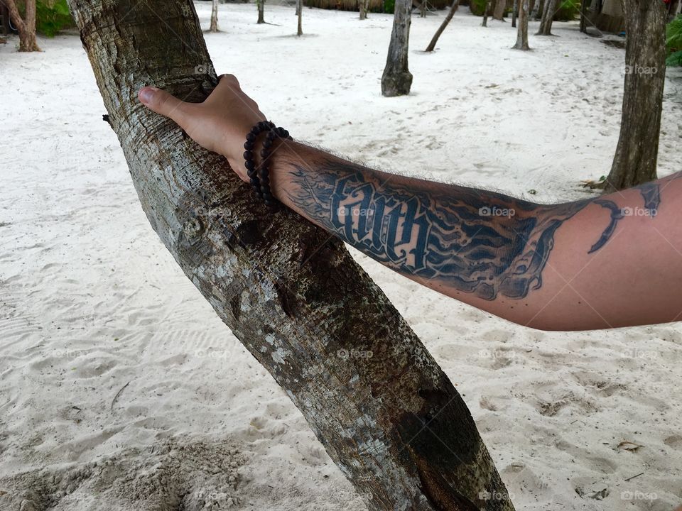 My ambigram arm tattoo in deep roots