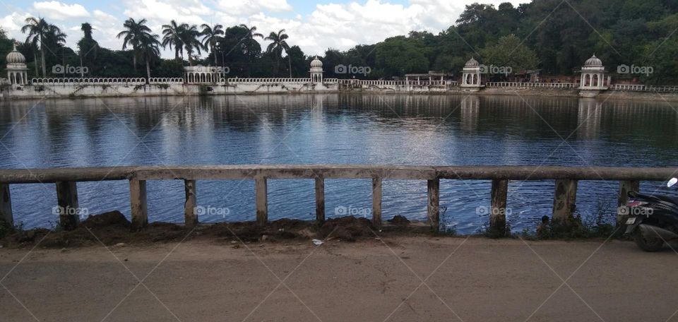 A beautiful lake shot with a tinch of urban nature.