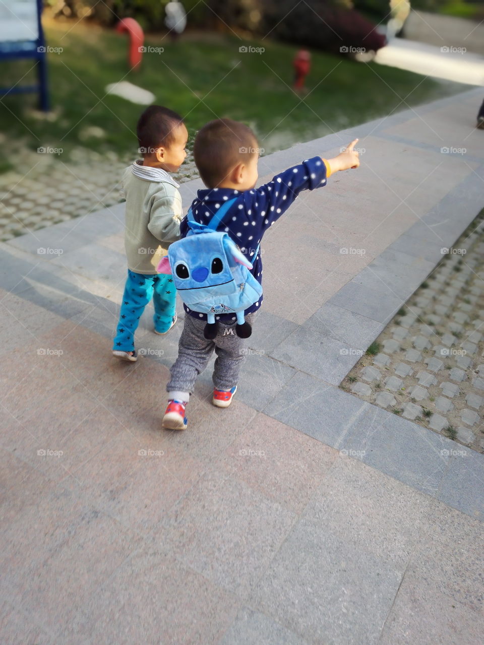 daily life. two kids together. please look at there. he said. he seems like really big guy.