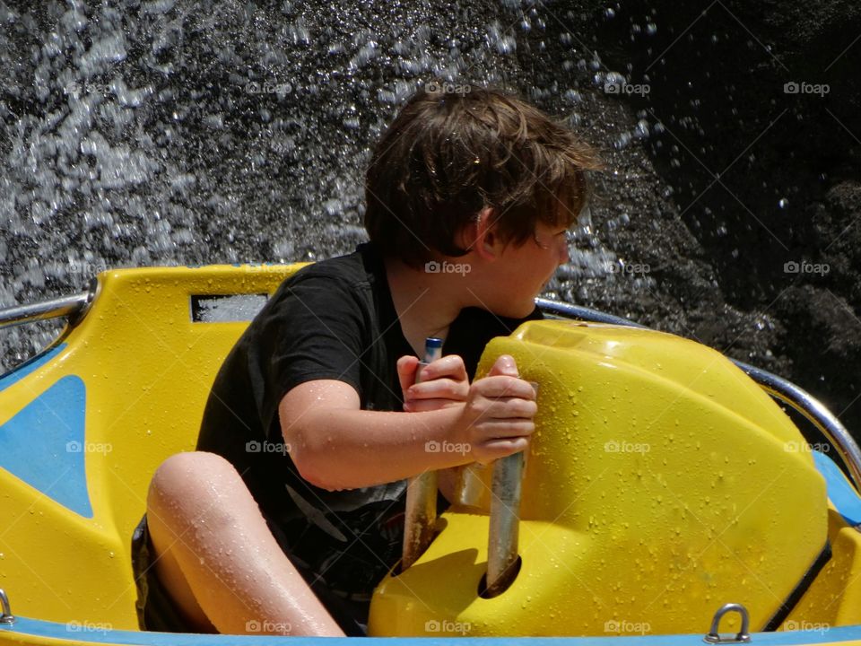 Boy In A Toy Boat