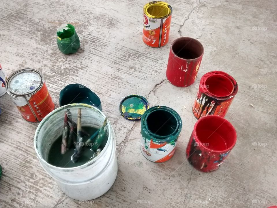 painting 2. cans  of paint,