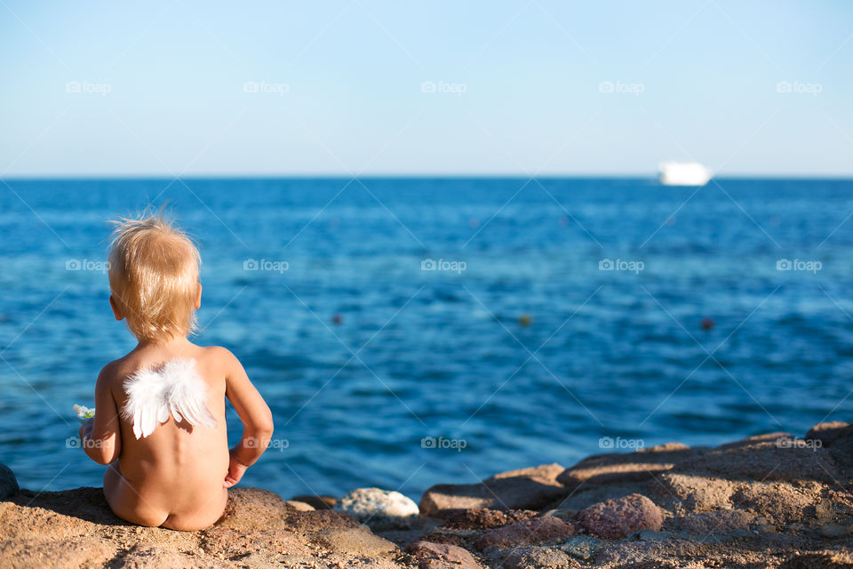 Amazing angel near the sea