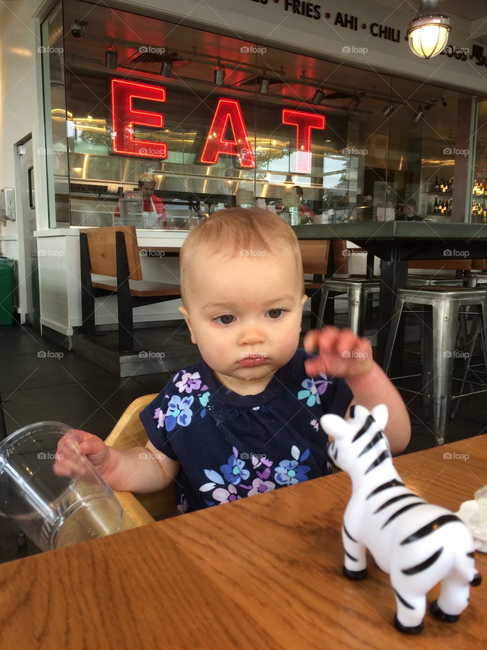 Waiting to eat baby. Baby waiting for food at restaurant 