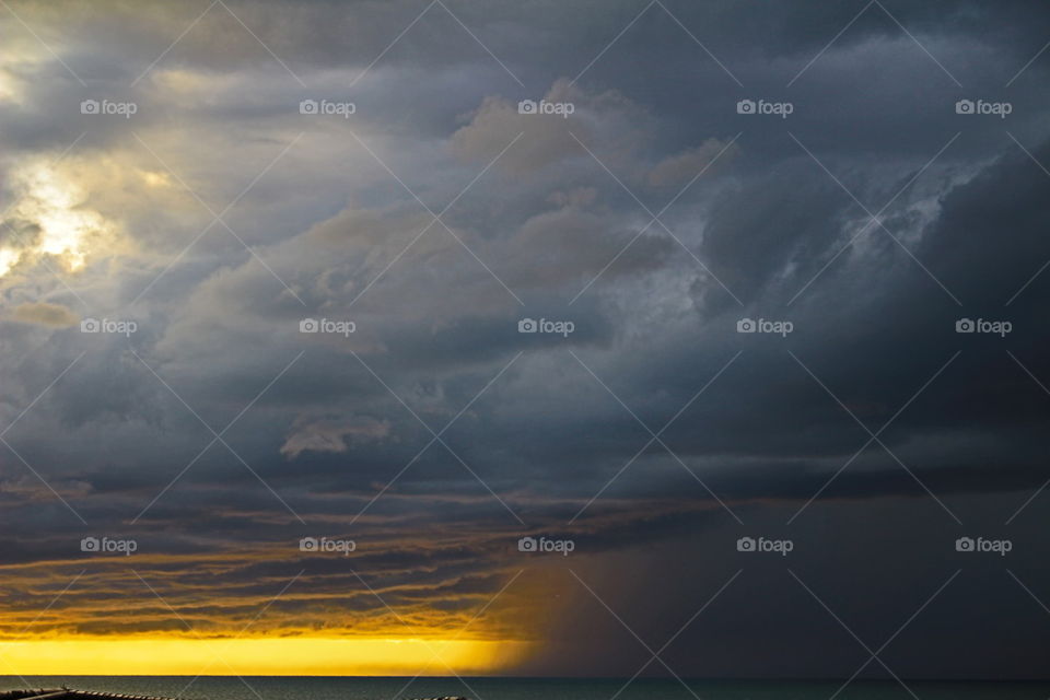 Sea against dramatic sky