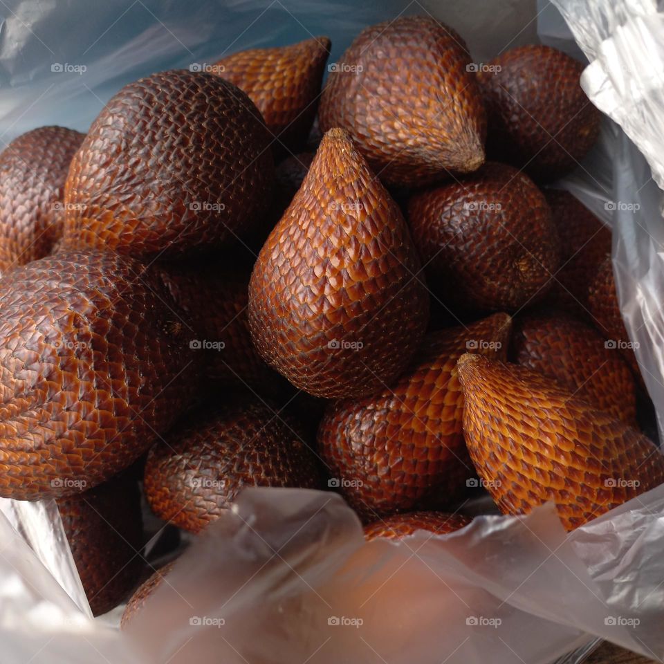 Salacca zalacca is a type of palm fruit commonly eaten