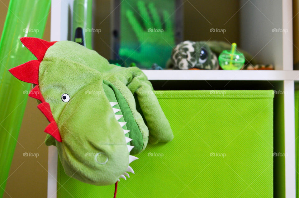 Child's shelving unit filled with toys