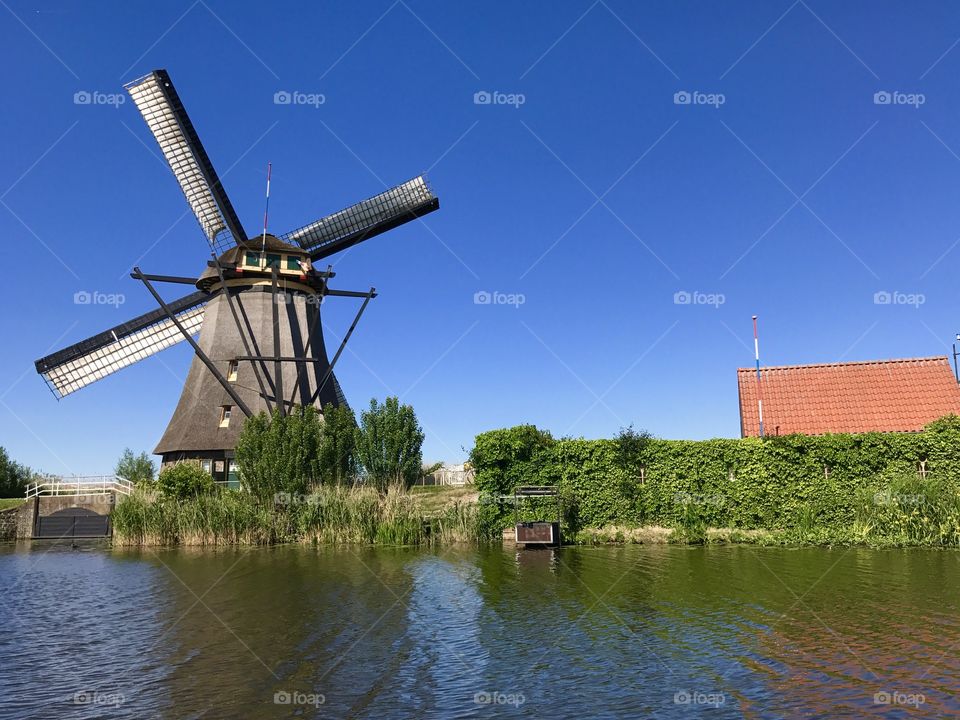 A  windmill, mill near the water in Holland 