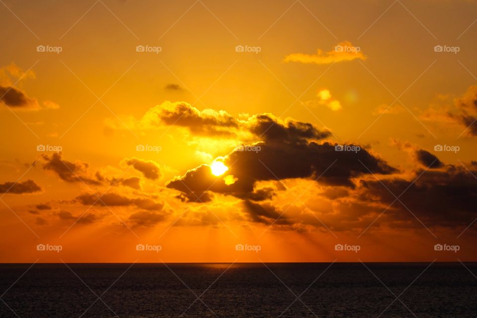 Scenic view of sea at sunset