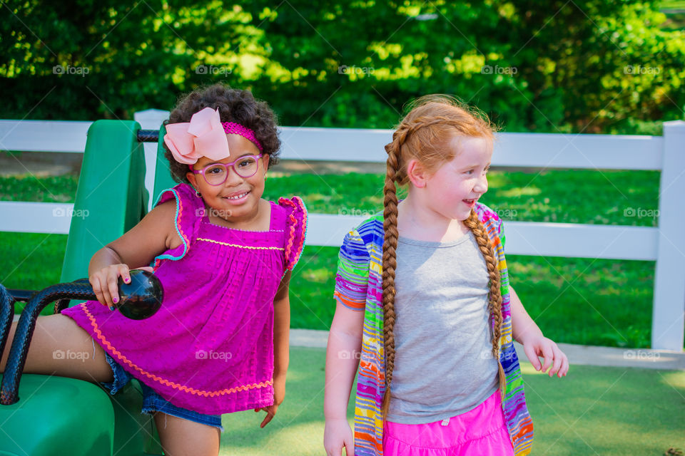 Two Young Girls at the Playground 