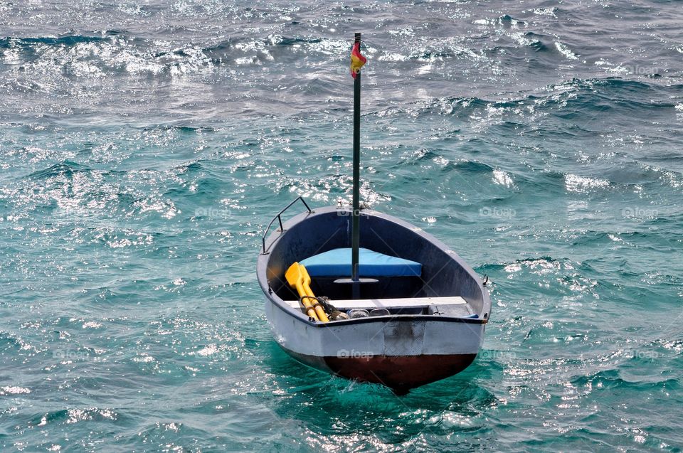 the lonely fishing boat in punta de mujeres on lanzarote canary island in spain