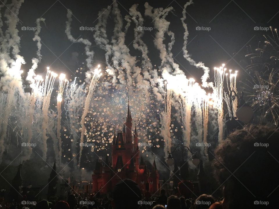 A photograph taken at Disney’s Magic Kingdom in Florida, USA during their Halloween fireworks display.