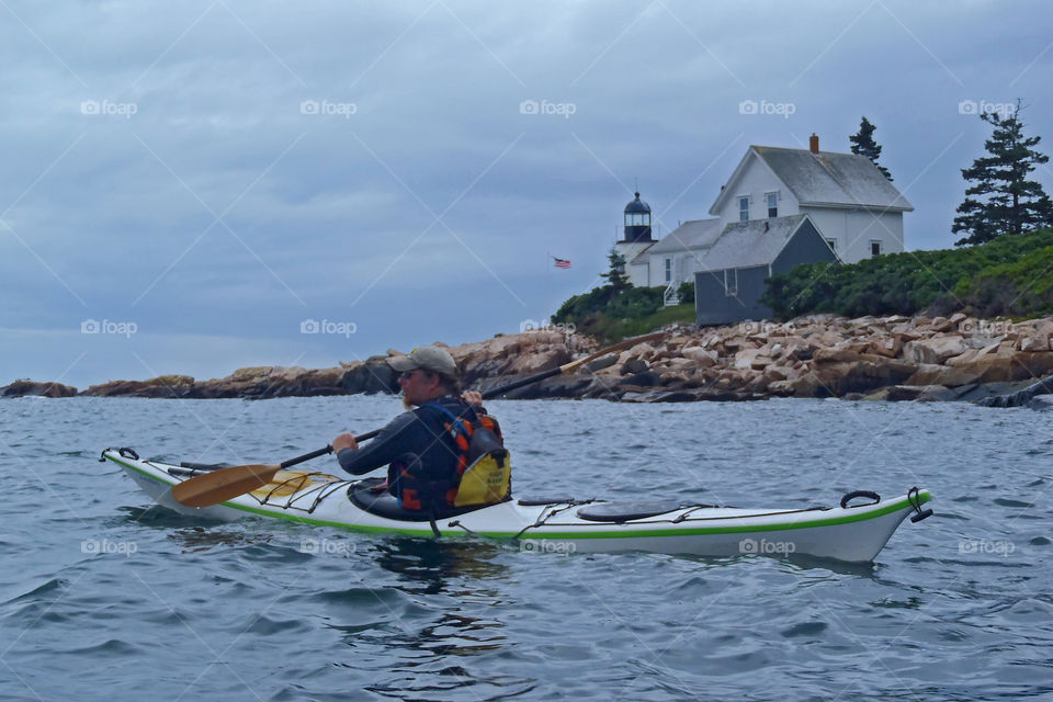 Paddling by Mark Island Lighthouse in Frenchman Bay Maine