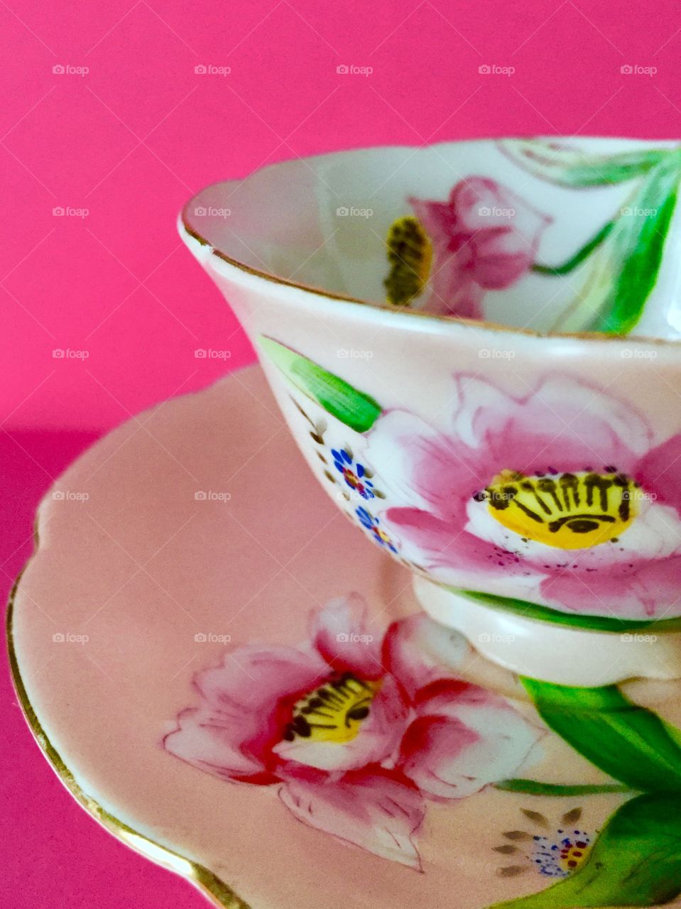 Antique floral ceramic cup