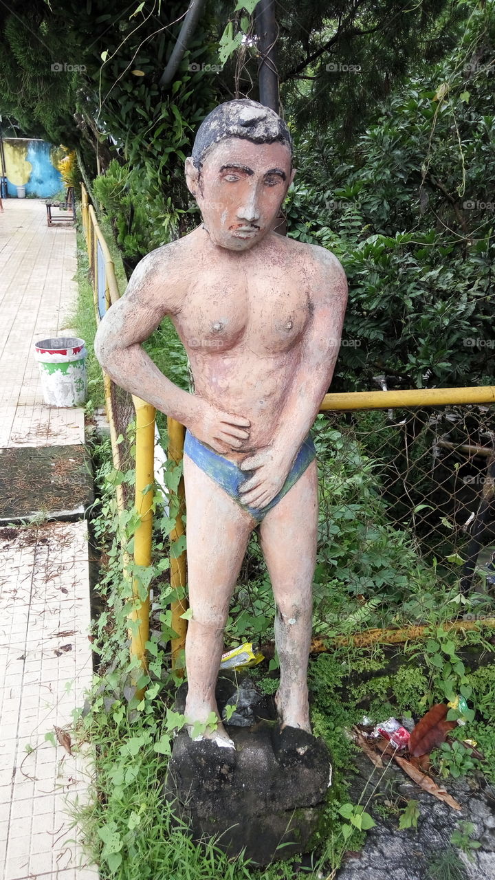 statue at swimming pool