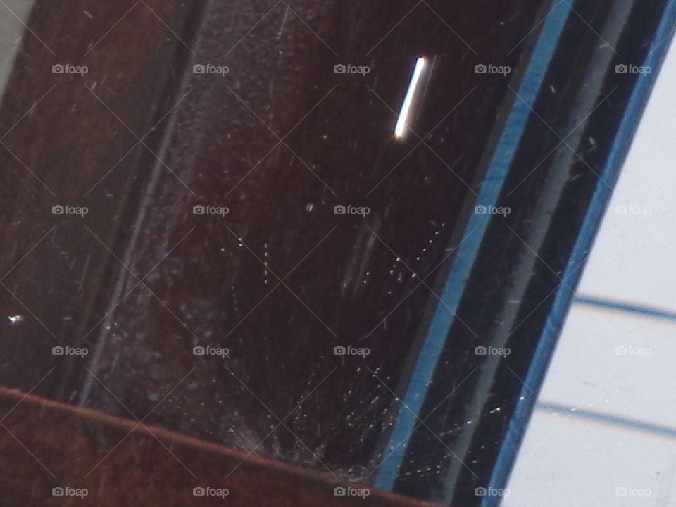 "Drop of water getting reflected by sun"