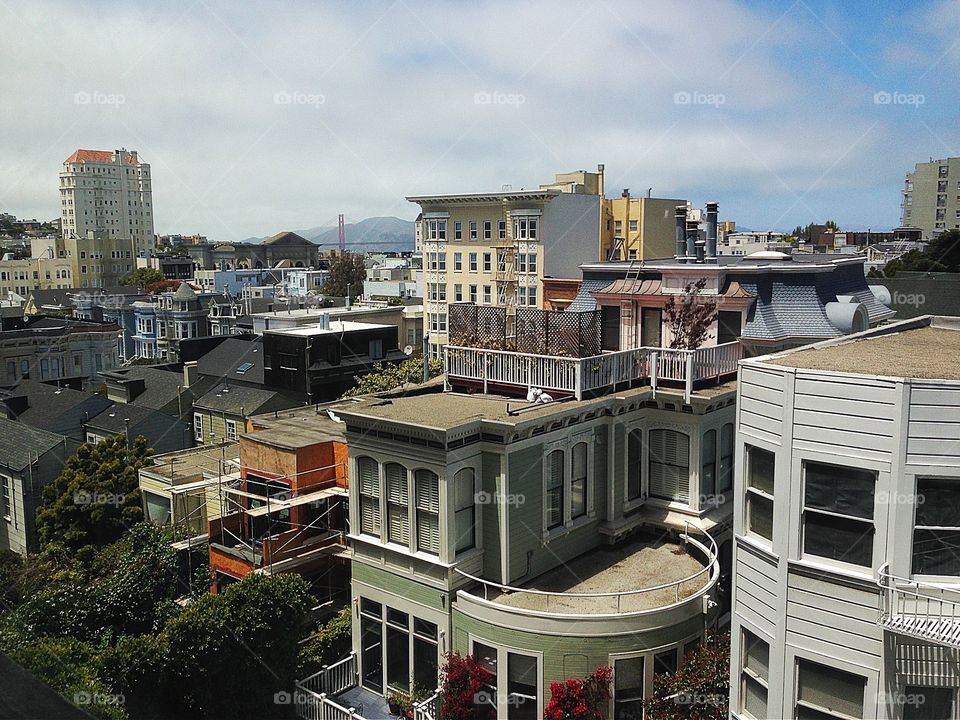 SanFrancisco View architecture from the rooftops. SanFrancisco View from the rooftops, Golden Gate Bridge in distance