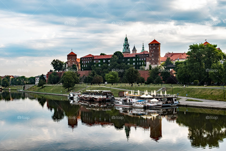 Restaurants on the Vistula river, Wawel Castle, Krakow Poland, reflection