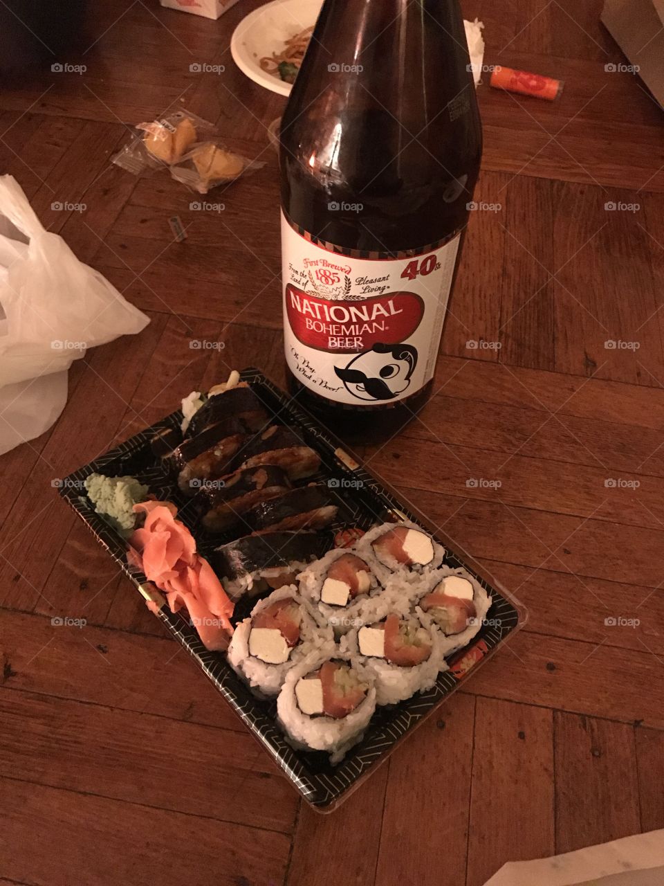 Baltimore life. Sushi and a forty on the floor. New apartment, happy meals.