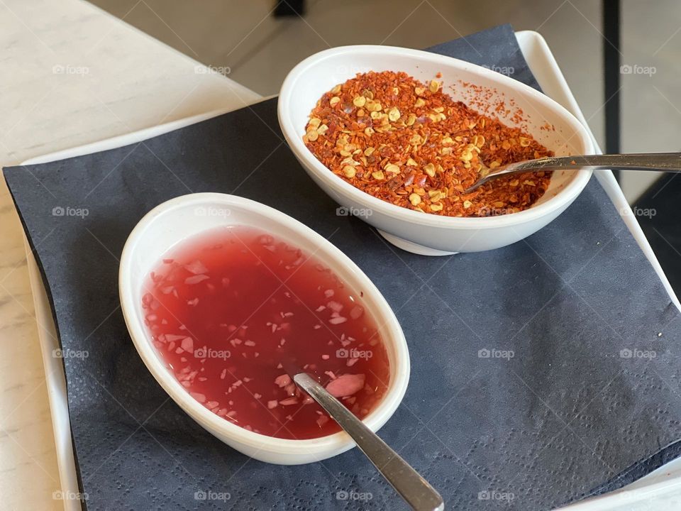 Colourful spices and vinegar with garlic 
