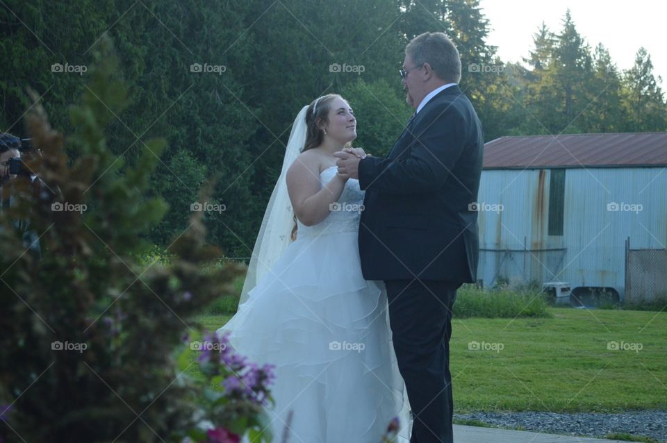 A beautiful bride and her father