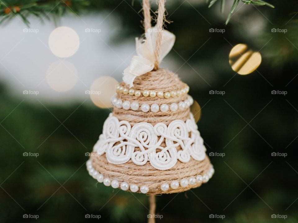 Openwork bell on a Christmas tree