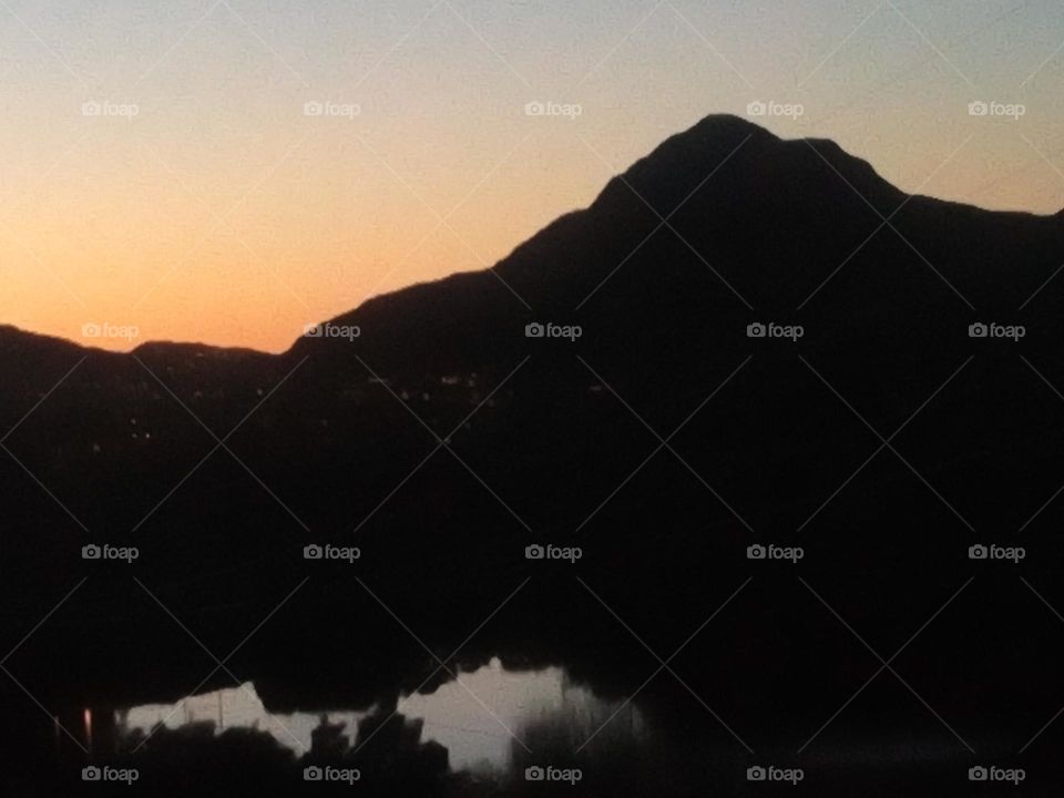 sunset behind mountain in Norway