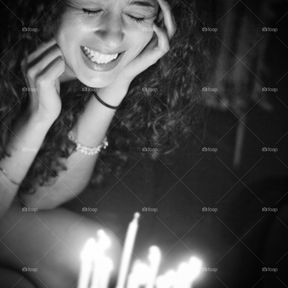 Birthday Girl. 30th birthday celebration with cake and candles.