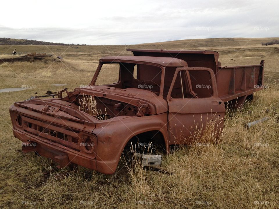 Old abandoned Rusty truck in the country