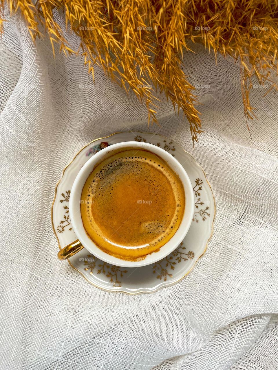  Timeless Elegance: Coffee in a Vintage Porcelain Cup.