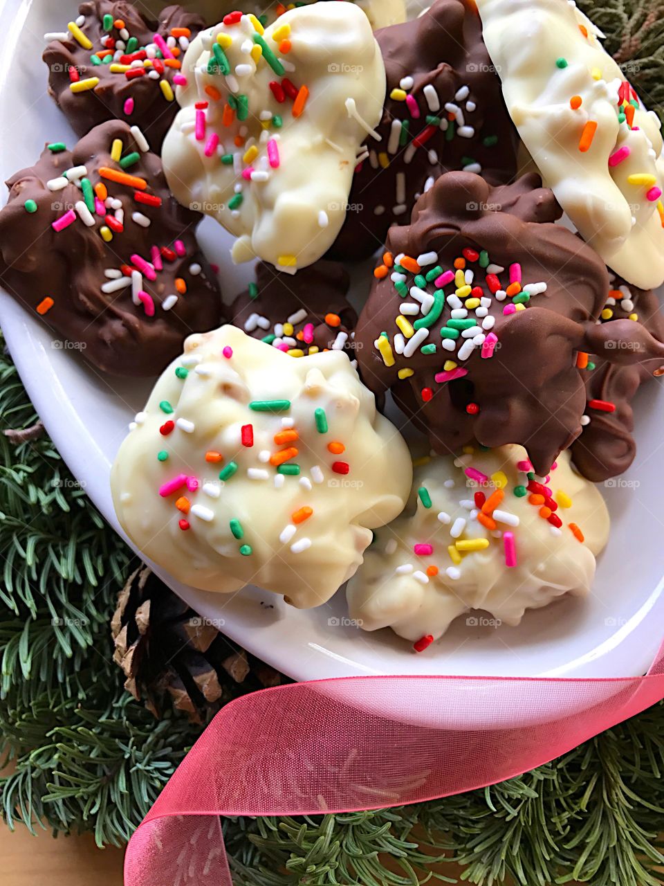 Christmas candies with evergreens