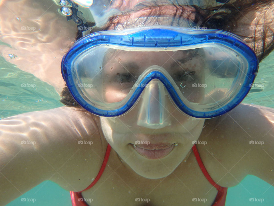 woman with mask. woman with diving mask underwater