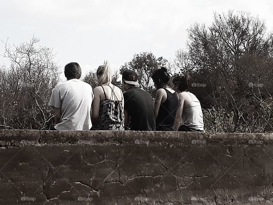 sitting with friends