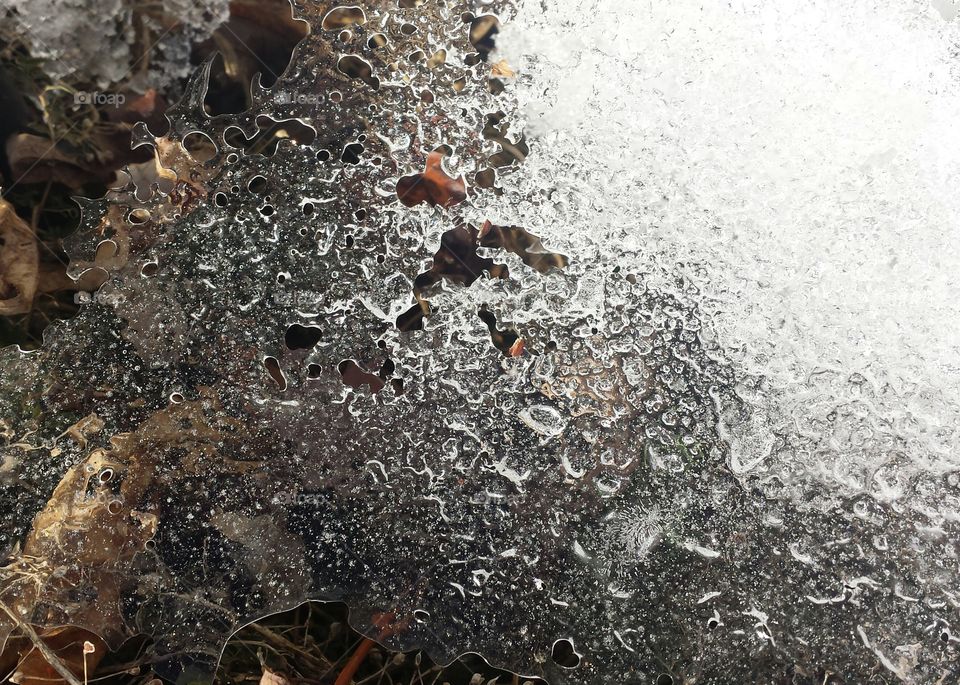 ice. ground beginning to thaw