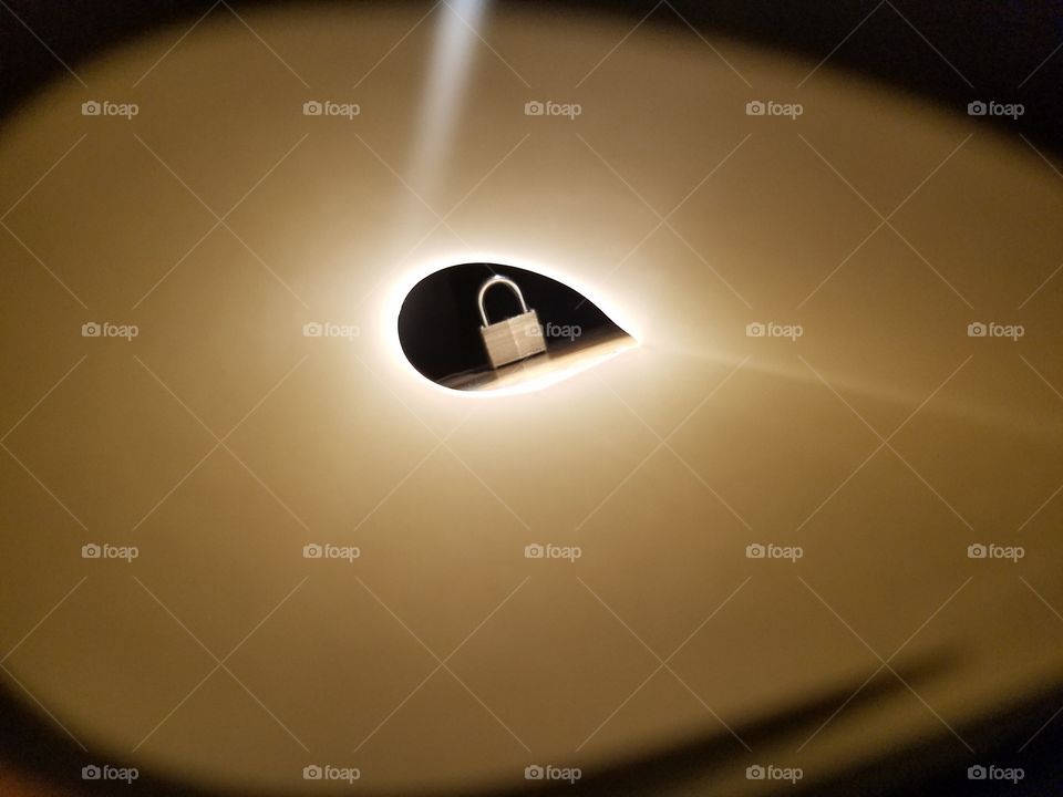 The lock seems to be the light at the end of the short tunnel that leads to seemingly otherwise dark atmosphere.