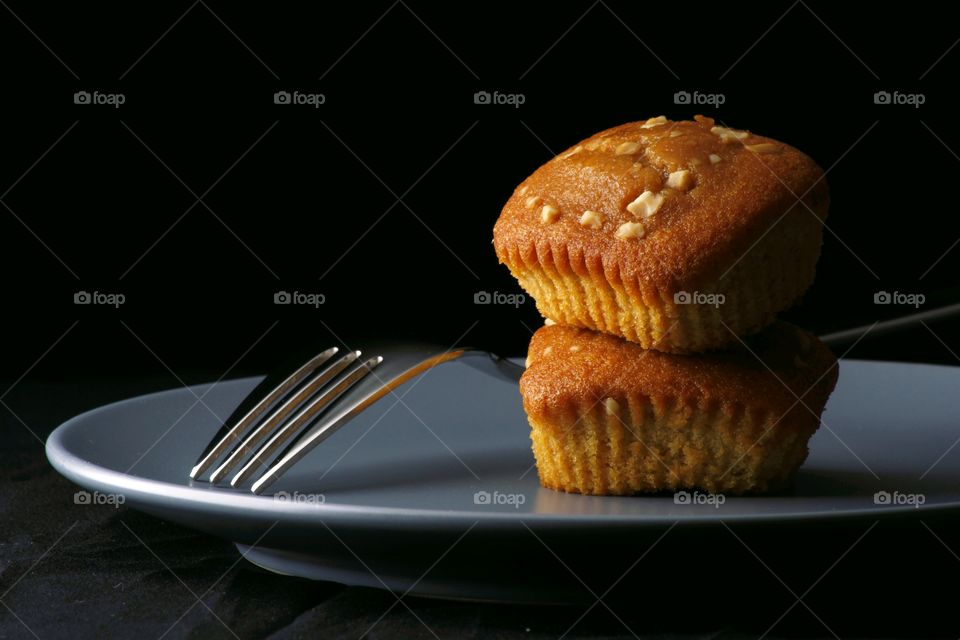 butterscotch bars on a plate and a fork