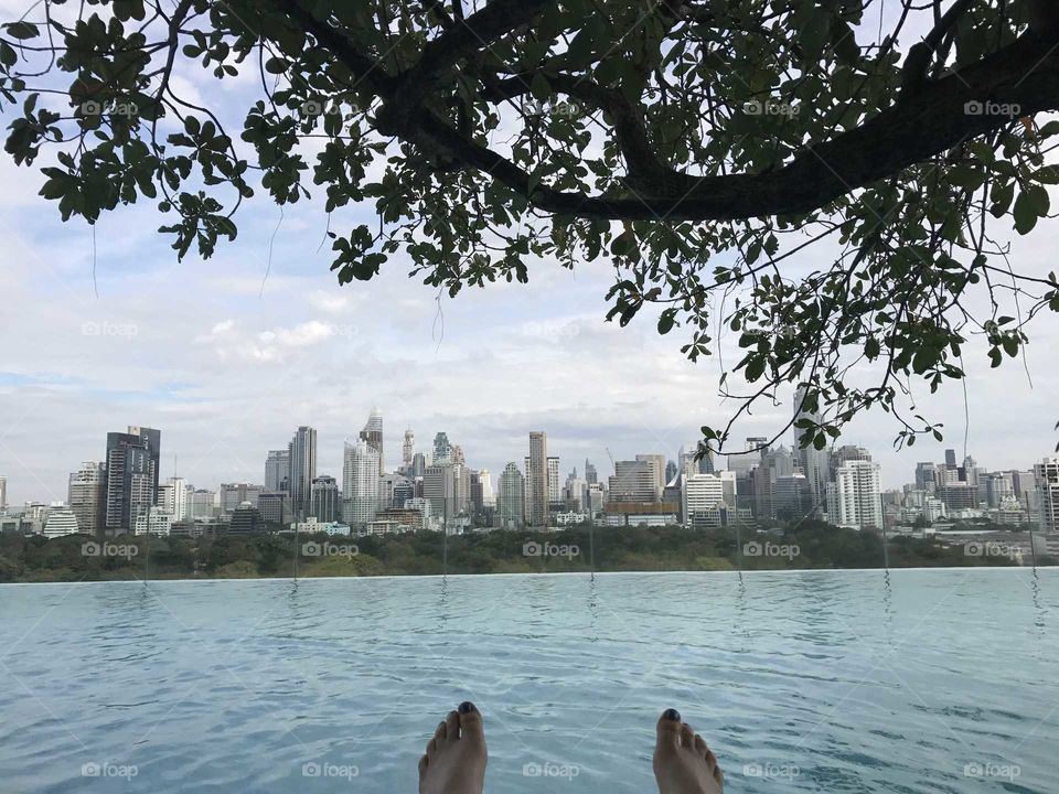 Bangkok skyline seen from the rooftop infinity pool an so sofitel bangkok