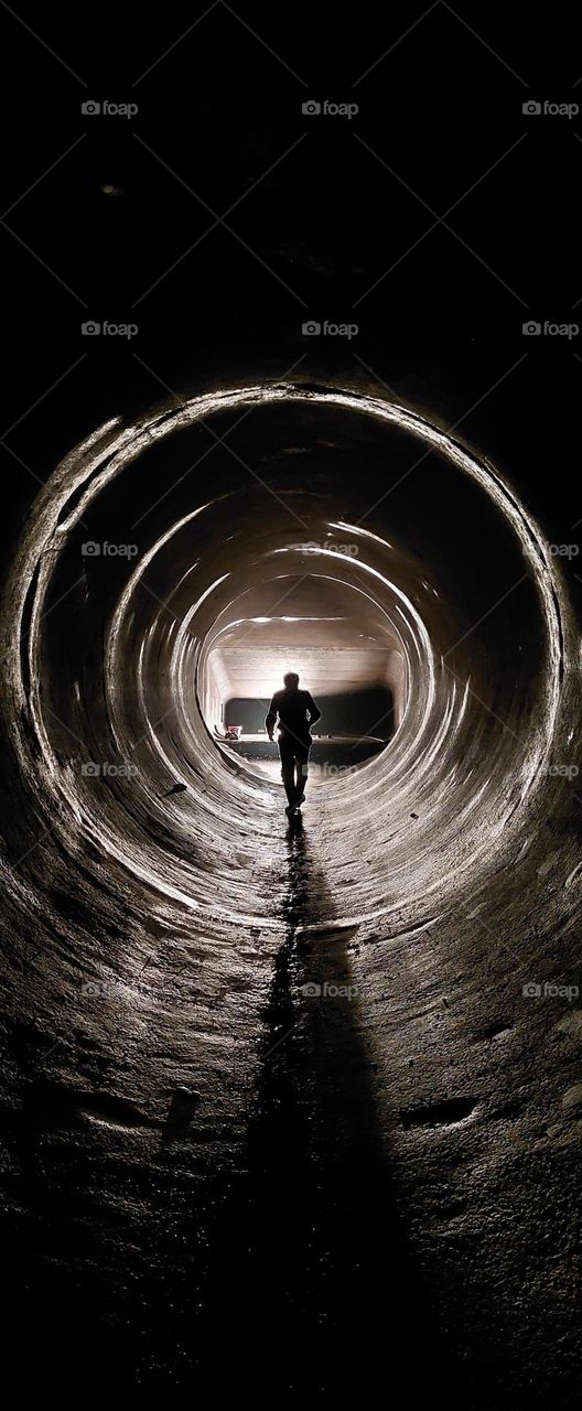 Luminous Pathways: Walking Through the Steel Portal