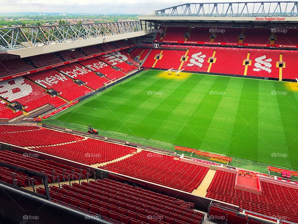 English football stadium. This is Anfield. Liverpool football club. Empty red stadium.